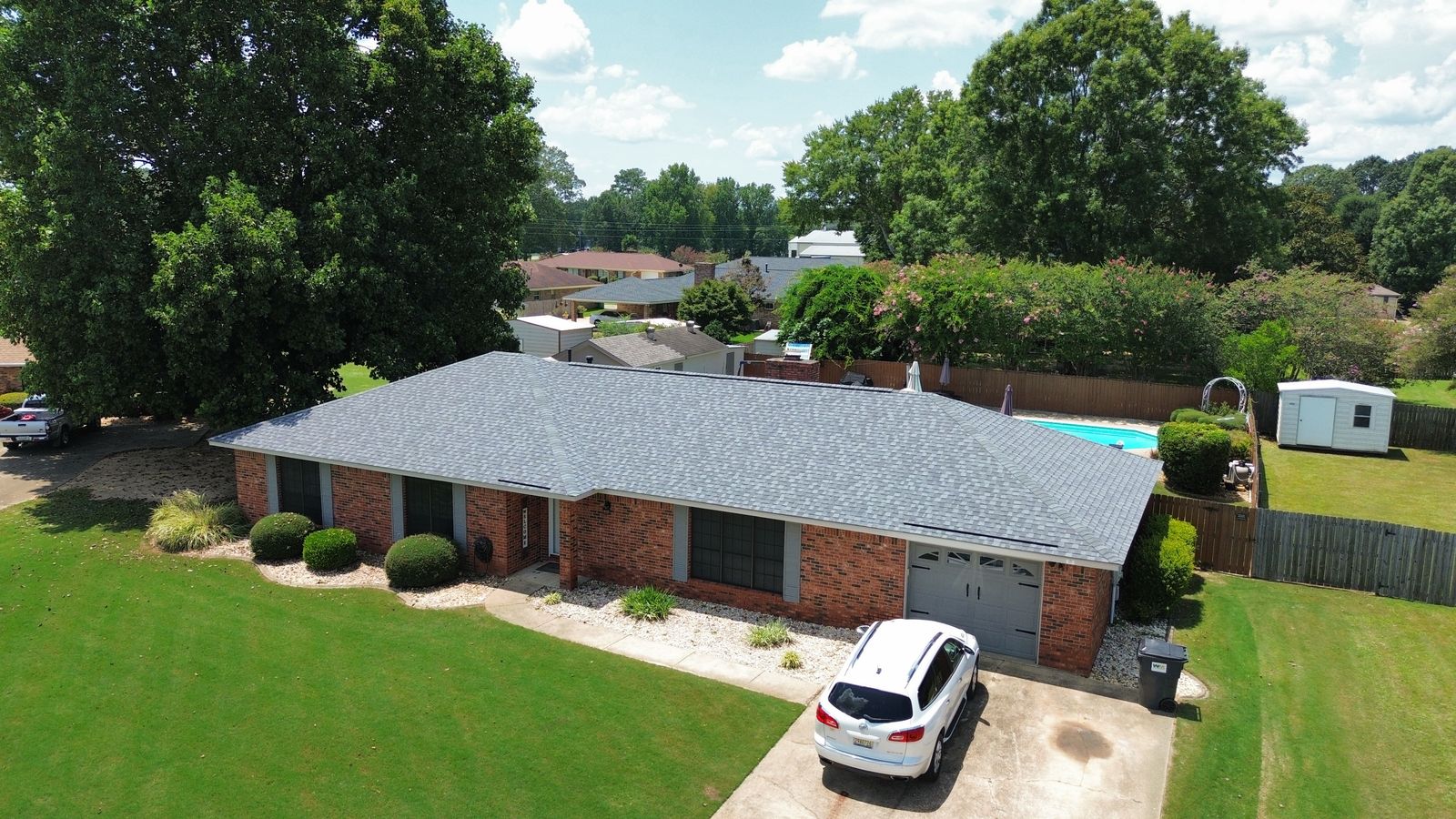 Completed roof replacement on a brick ranch home in Alabama