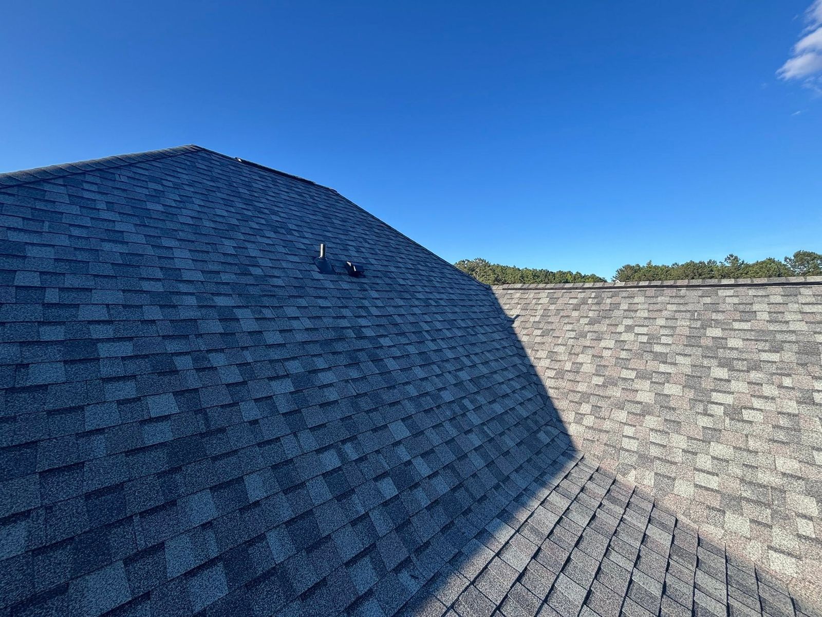 New architectural shingles installed after storm and hail damage in Alabama